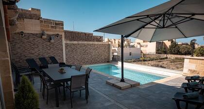 Serena Farmhouse is a Rustic and spacious 5-bedroom with pool and jacuzzi.