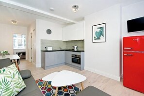 Coffres-forts dans les chambres, fer et planche Ă repasser