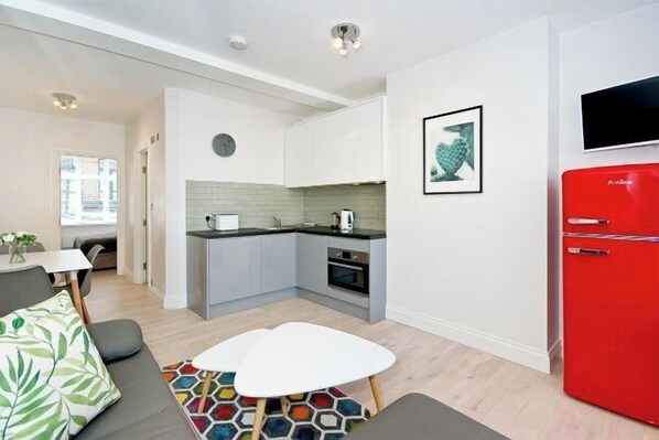 Safe på rommet og strykejern/-brett