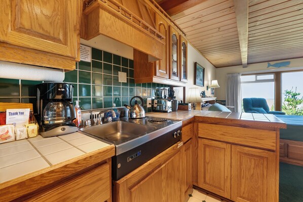 Fridge, microwave, stovetop, coffee/tea maker