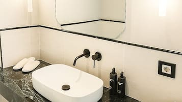 Shower, bathrobes, slippers, bidet