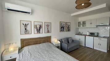 1 dormitorio, tabla de planchar con plancha, cuna de viaje y wifi gratis