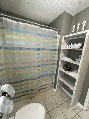 Hair dryer, towels, soap, toilet paper