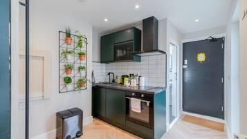 Coffee/tea maker, fridge, microwave