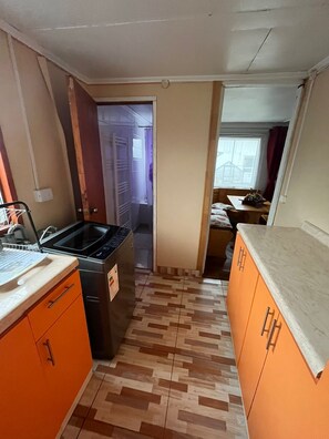 Family Cabin, Patio, Garden View | Private kitchen