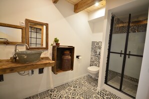 Shower, hair dryer, towels, toilet paper