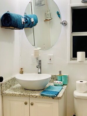 Shower, hair dryer, towels, soap