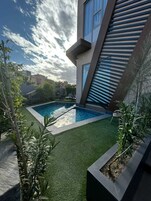 Outdoor pool, open 8:00 AM to 8:00 PM, sun loungers