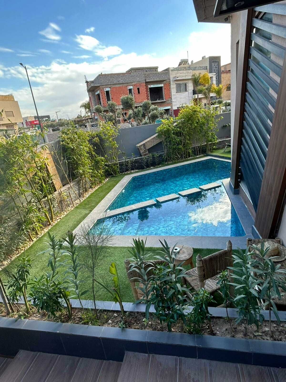 12 outdoor pools, pool loungers