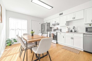 Townhome, Multiple Beds, Kitchen (The Capri Villa) | Dining