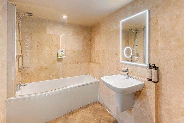 Shower, hair dryer, towels, soap