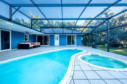 Waterfront Oasis with Pool & On-Site EV Charging.