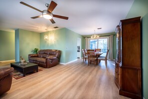 Living area - Waterfront Oasis with Pool & On-Site EV Charging. (Osteen)