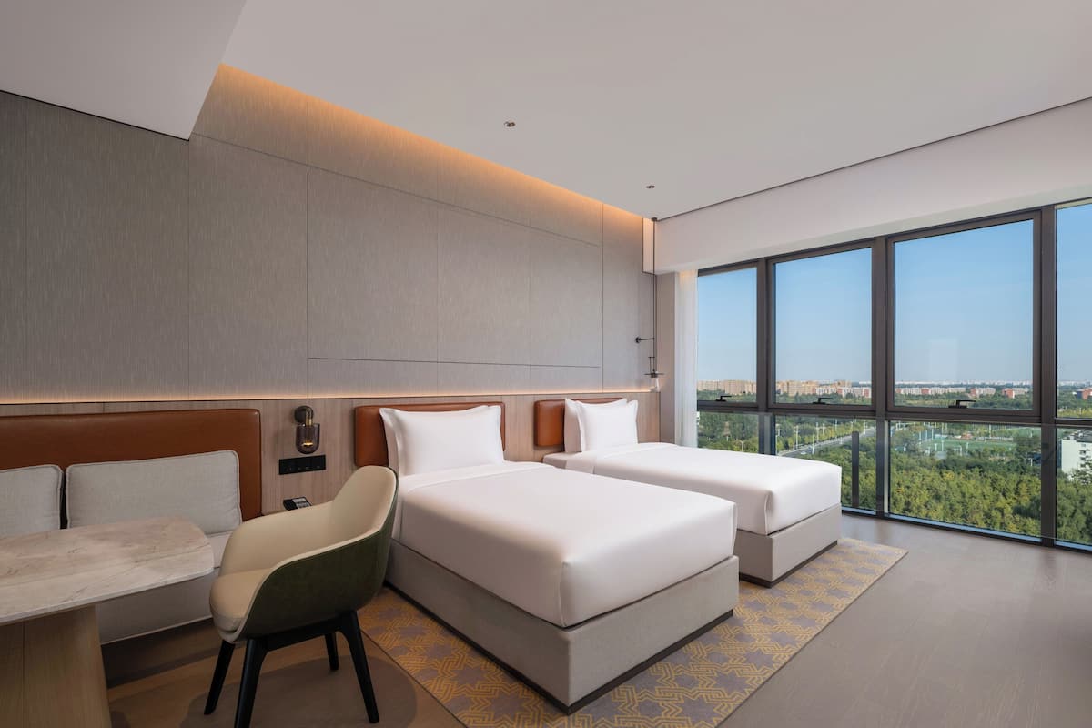 Deluxe-huone, 2 yhden hengen sänkyä | Tallelokero huoneessa, työpöytä, silitysrauta/-lauta, ilmainen Wi-Fi