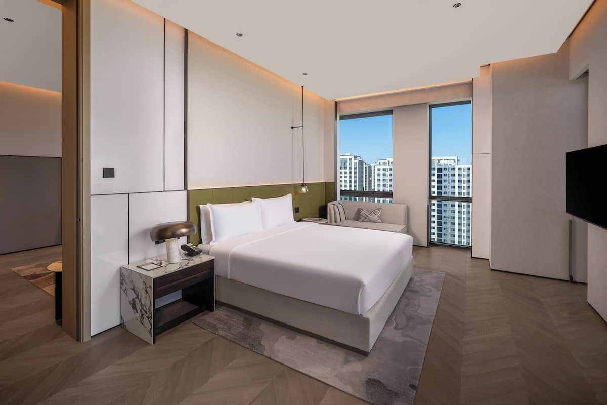 Suite, 1 Bedroom, City View | Down comforters, in-room safe, desk, blackout drapes