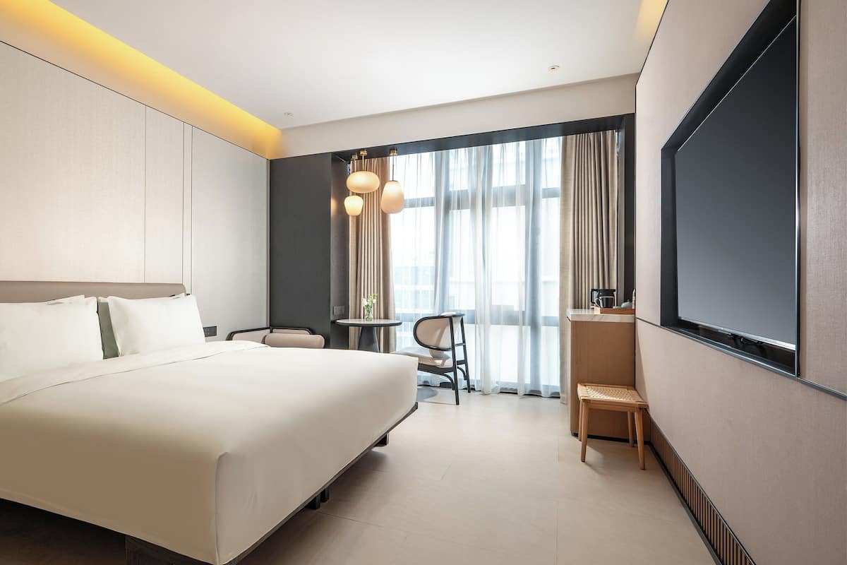 1 King Standard Balcony | Premium bedding, down duvets, laptop workspace, blackout curtains