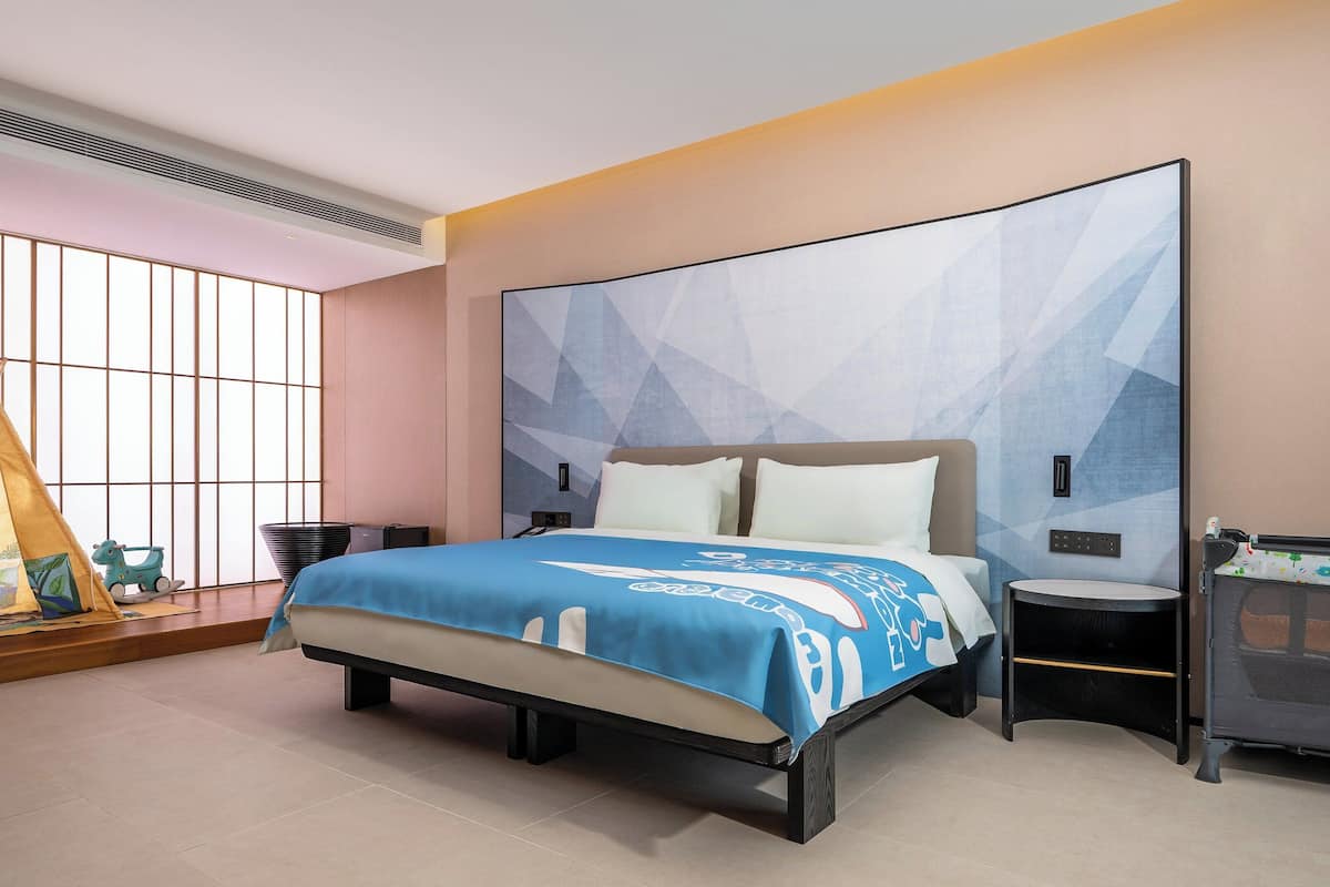 1 King Standard Kids Theme With Bath | Premium bedding, down duvets, laptop workspace, blackout curtains