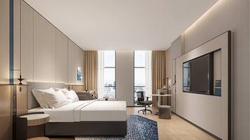 Premium bedding, down duvets, desk, laptop workspace