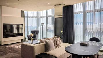 Suite, 1 Bedroom (Living and Dining Area) | Minibar, in-room safe, individually decorated, iron/ironing board