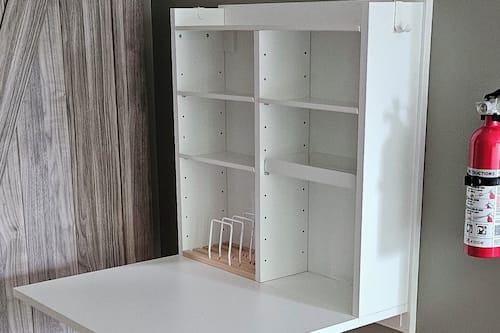 Suite studio luxueuse, 1 très grand lit, non-fumeur, salle de bain privée | Rideaux d’obscurcissement, fer et planche à repasser