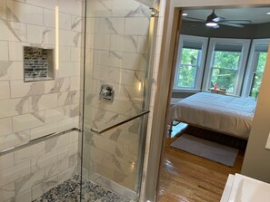 Luxury Studio Suite, 1 King Bed, Non Smoking, Private Bathroom | Bathroom | Separate bathtub and shower, hair dryer, towels, soap