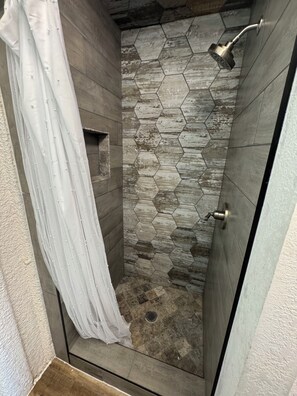 Shower, towels, soap, toilet paper - Stylish Container Home Getaway (Azle)