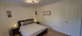 Fully furnished 1-bedroom suite Ground level unit, detached home with patio door