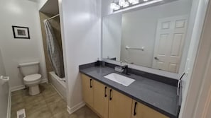 Hair dryer, towels, soap, shampoo