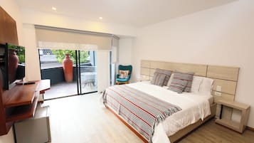 Deluxe Suite, Balcony, City View | In-room safe, desk, free WiFi