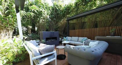 stylish beach escape - chic indoor to tropical outdoor flow - minutes to beach.