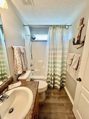 Shower, jetted tub, hair dryer, towels