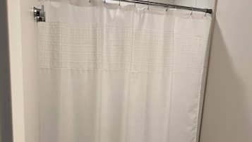 Shower, hair dryer, towels, toilet paper
