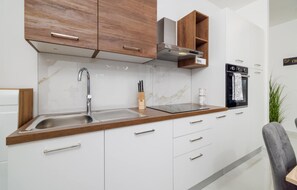 Oven, stovetop, dishwasher, coffee/tea maker