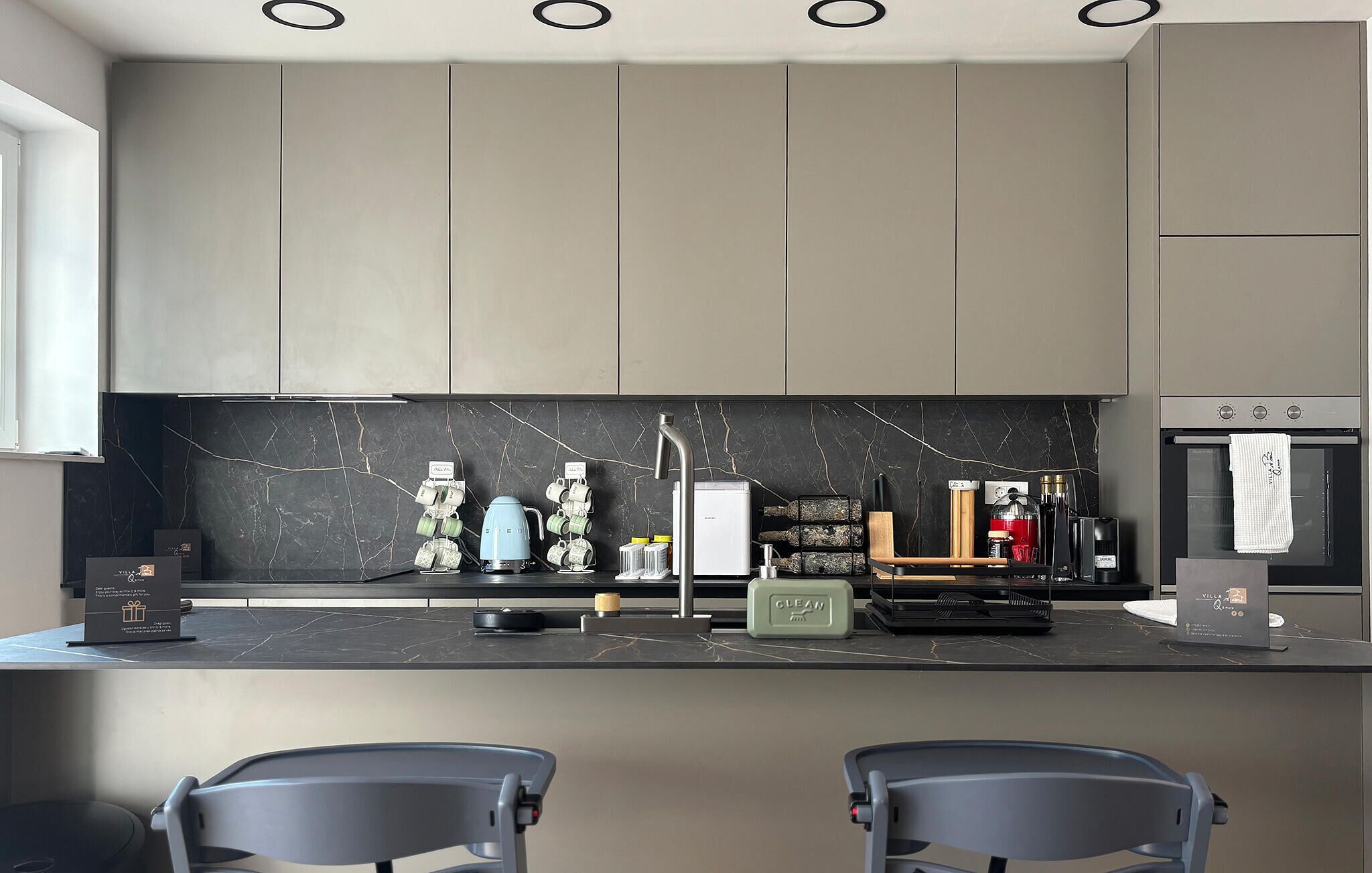 Fridge, stovetop, dishwasher, coffee/tea maker