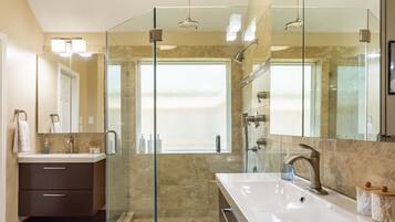 Shower, hair dryer, towels, soap