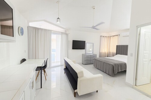 Comfy Sosúa Condo - private balcony, Remote Working, Steps to Beach & Nightlife