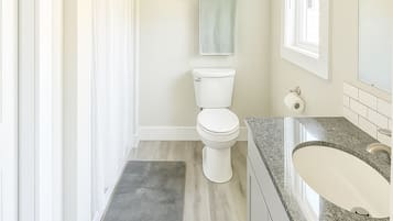 Hair dryer, towels, soap, toilet paper