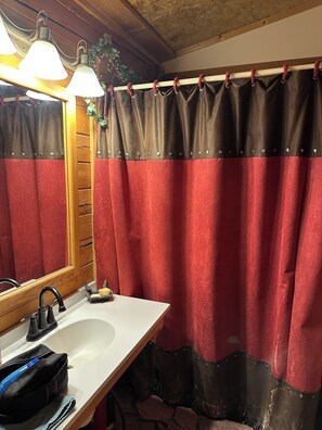 Shower, eco-friendly toiletries, hair dryer, towels