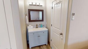 Hair dryer, towels, soap, shampoo