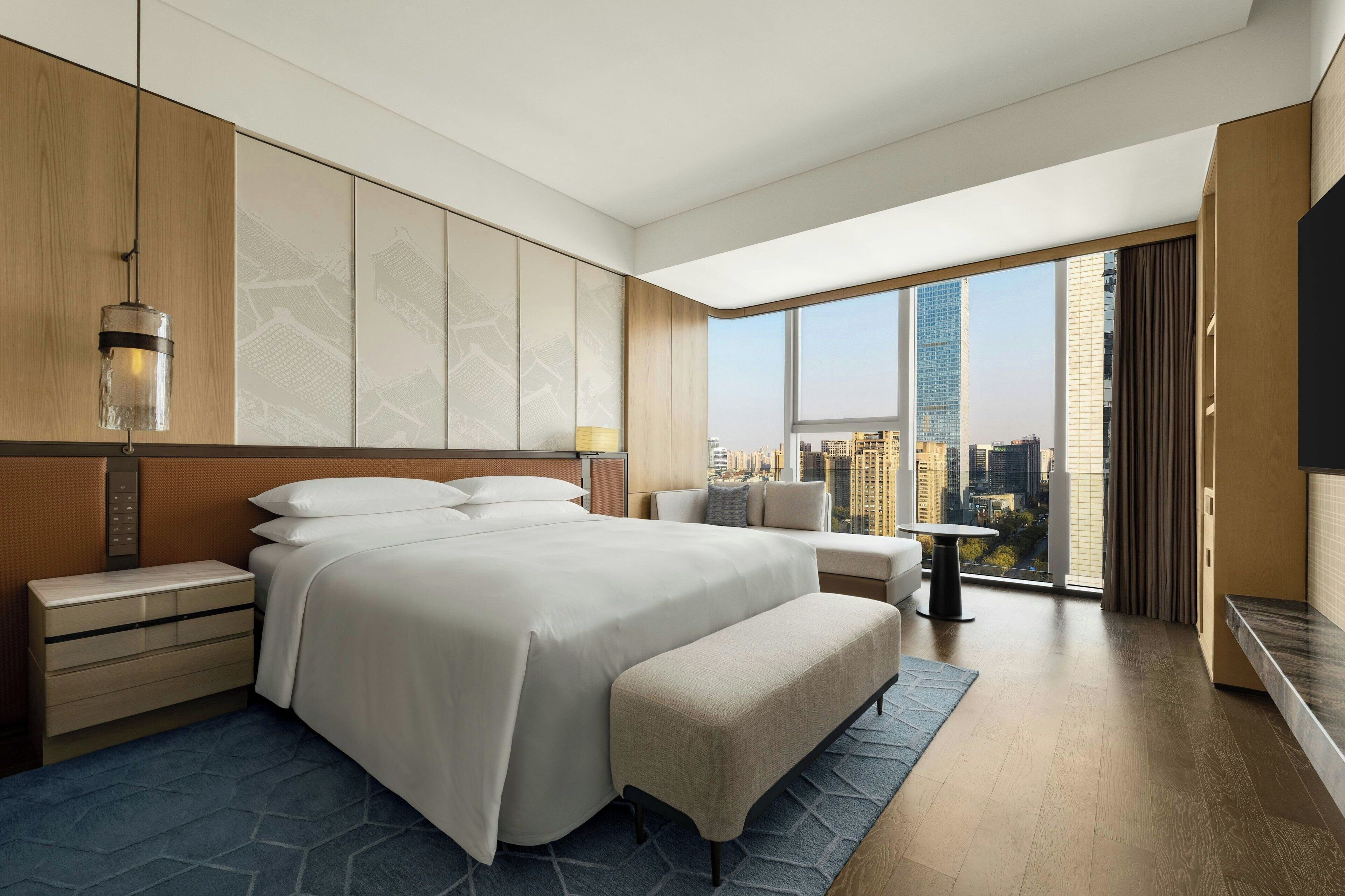 Deluxe Suite, 1 King Bed, City View | Down comforters, minibar, in-room safe, desk