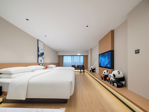 A modern hotel room with a large bed, a TV, and decorative panda figures. - Fairfield By Marriott Chengdu Tianfu Square (Chengdu)