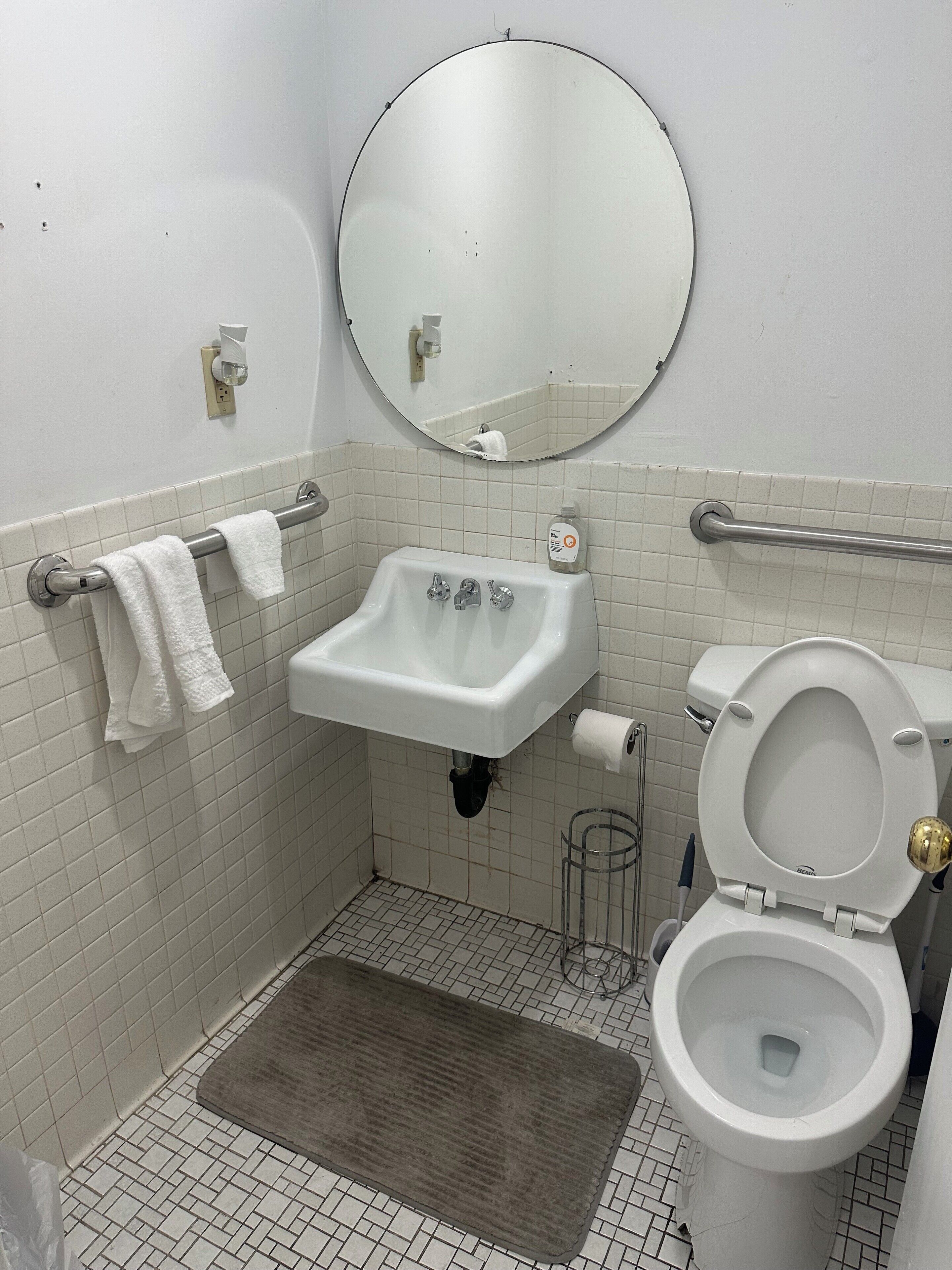 Shower, towels, soap, toilet paper