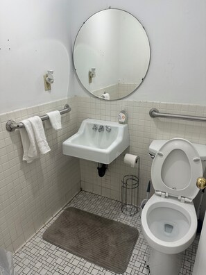 Shower, towels, soap, toilet paper