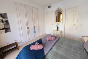 Iron/ironing board, travel crib, free WiFi, bed sheets