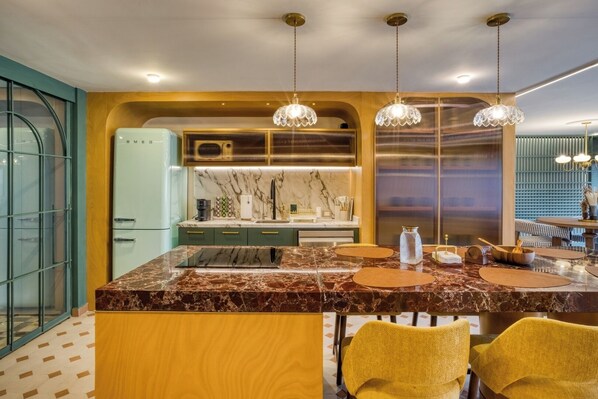 Fridge, microwave, stovetop, coffee/tea maker