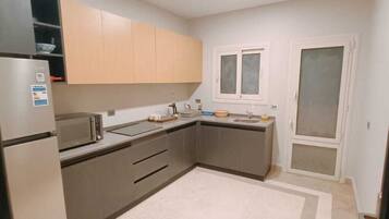 Căn hộ Cao cấp, 3 phòng ngủ, ban công, quang cảnh vườn | Bếp riêng | Lò vi sóng, bếp nấu, ấm điện, dụng cụ nấu nướng/bát dĩa/dao nĩa