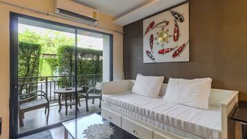 Apartamento, balcón | Zona de estar