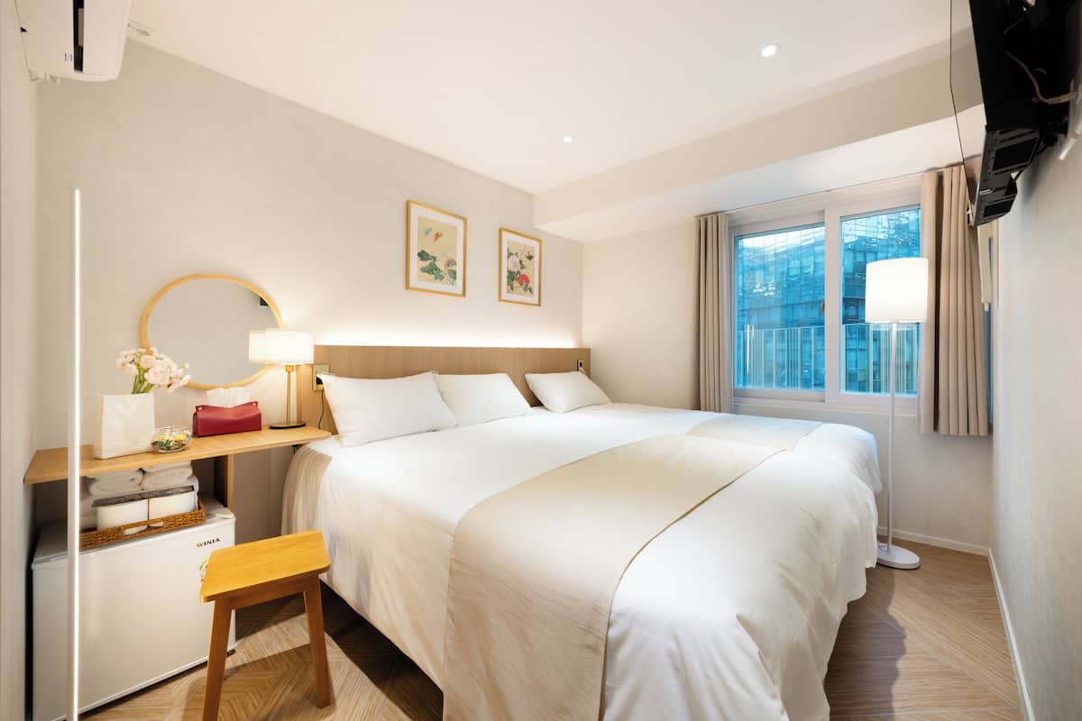 Habitación Deluxe con 2 camas individuales | Wifi gratis y ropa de cama