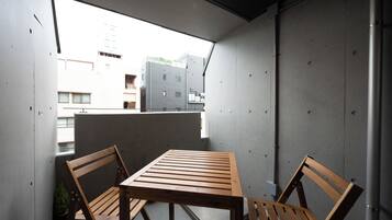 Suíte estúdio família | Terraço/pátio