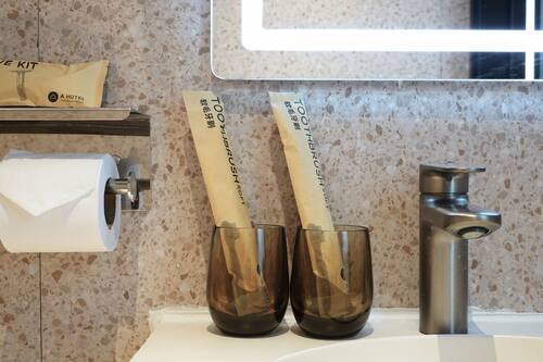 Shower, free toiletries, hair dryer, slippers